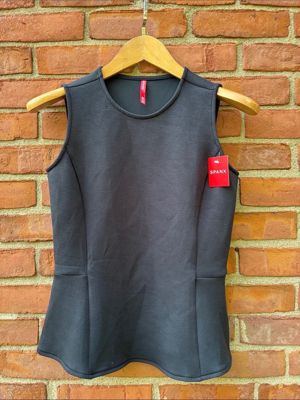 SPANX Black Sleeveless Peplum Shell Top